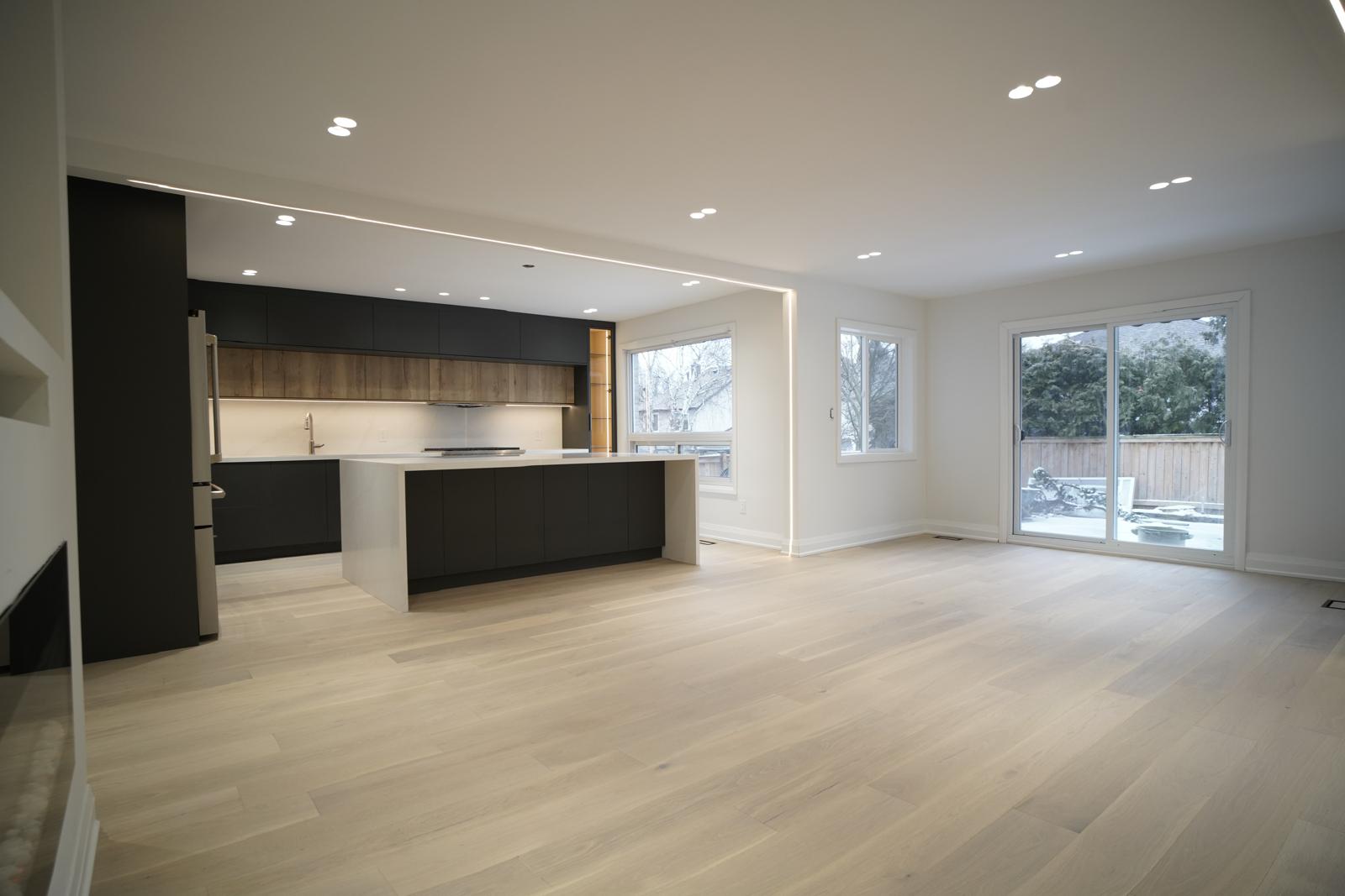 Open-concept kitchen and living room renovation in Thornhill by Ahoora Homes